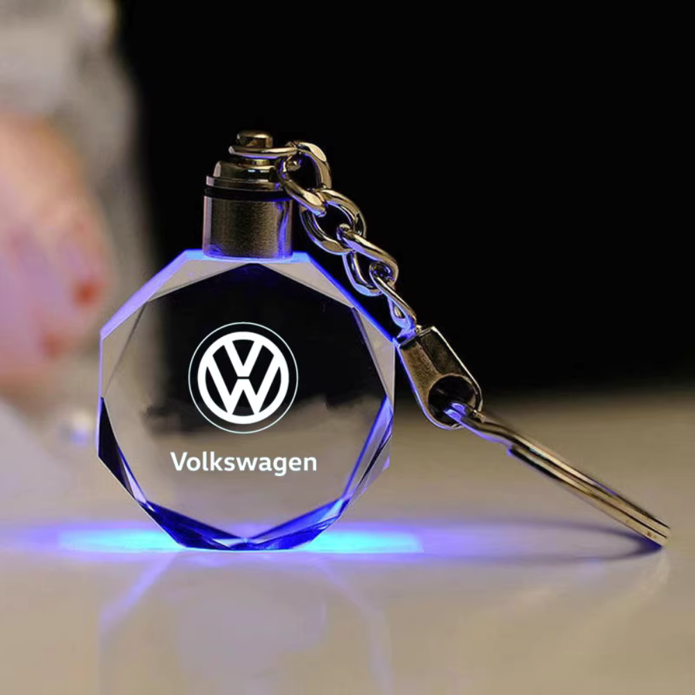Llavero con logotipo automovilístico en 3D de cristal